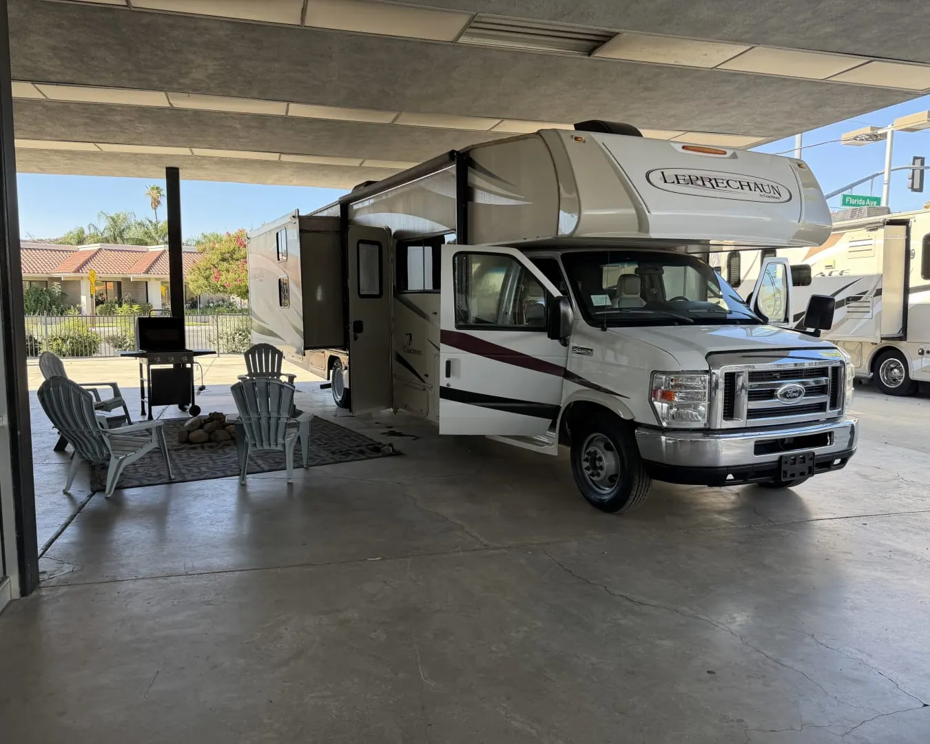 2018 Coachmen Leprechaun 310BH Class C motorhome with its door and slide open, ready for pickup